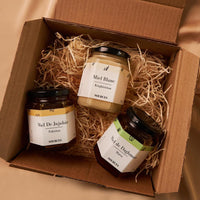 interieur d'un coffret de 3 miels differents du monde entier