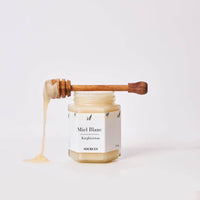 miel blanc kirghizistan fleur sainfoin fond blanc